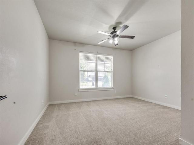 16405 Brookefield Dr, Edmond, OK 73013 - empty room featuring light carpet and ceiling fan