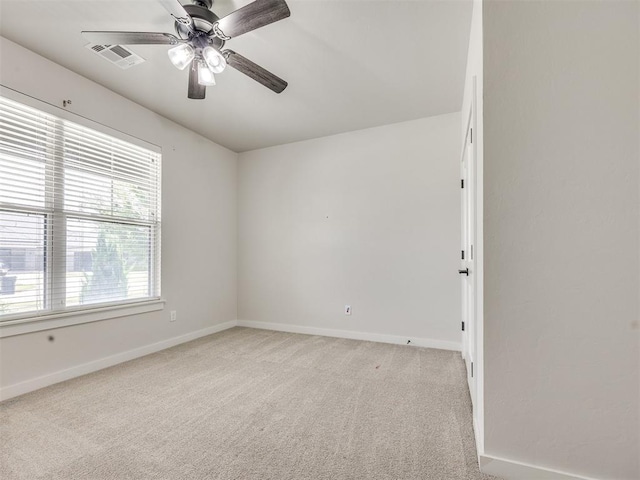 16405 Brookefield Dr, Edmond, OK 73013 - unfurnished room with ceiling fan and light carpet