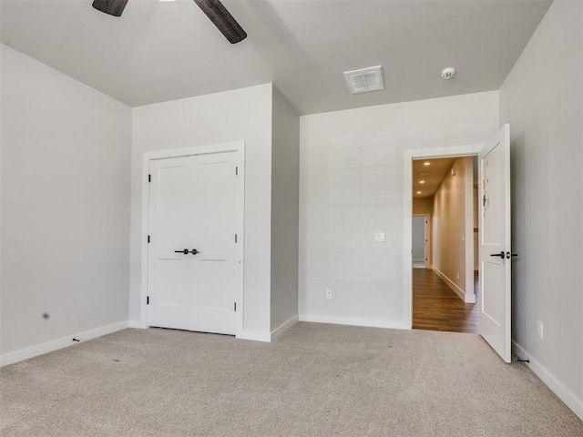 16405 Brookefield Dr, Edmond, OK 73013 - unfurnished bedroom with carpet flooring and ceiling fan