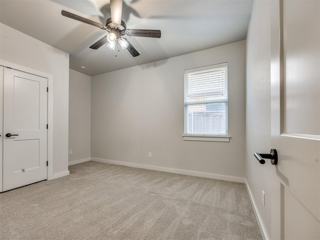 16405 Brookefield Dr, Edmond, OK 73013 - carpeted empty room featuring a ceiling fan and baseboards