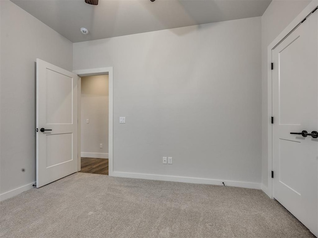 16405 Brookefield Dr, Edmond, OK 73013 - carpeted empty room featuring baseboards and a ceiling fan