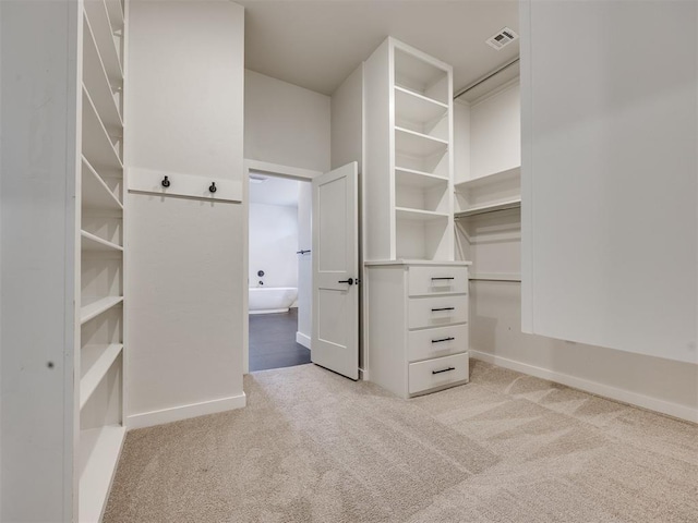16405 Brookefield Dr, Edmond, OK 73013 - walk in closet with light colored carpet