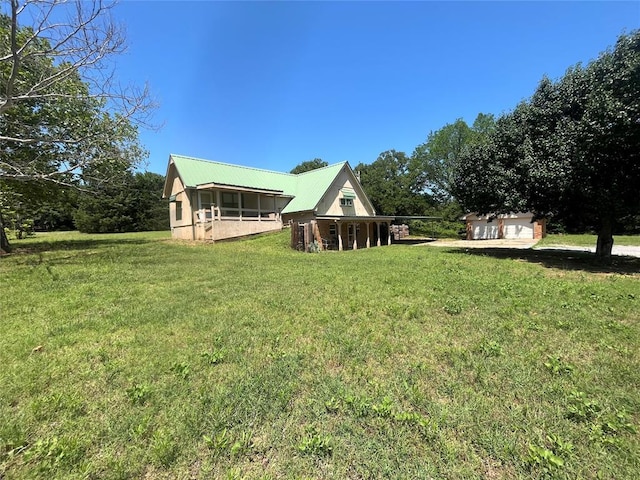 4179 W Gatlin St, Duncan, OK 73535 - view of green lawn featuring a sunroom