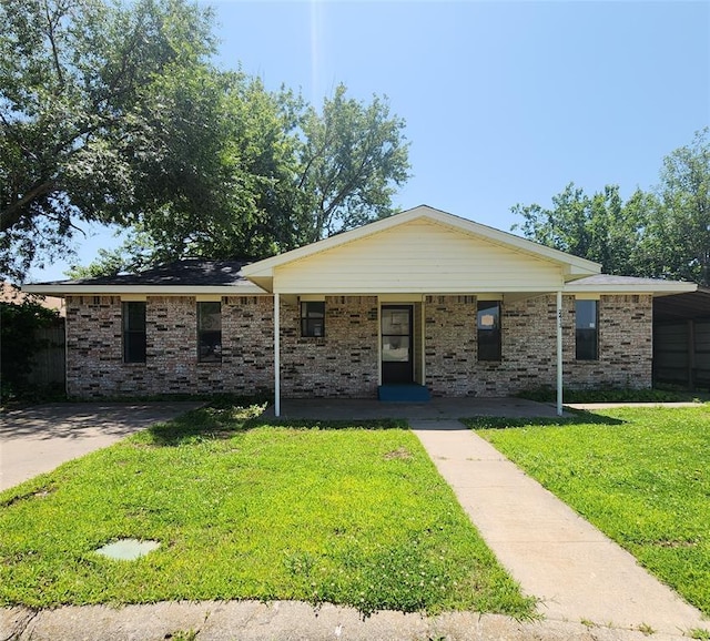 2413 7th St, Prague, OK 74864 - ranch-style house with a front lawn