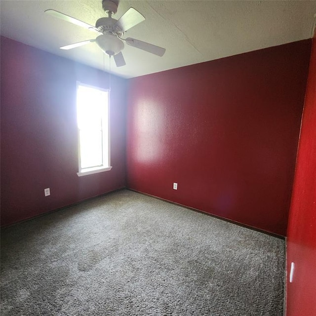 2413 7th St, Prague, OK 74864 - carpeted empty room featuring ceiling fan