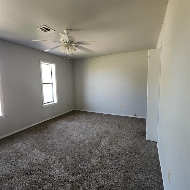 2413 7th St, Prague, OK 74864 - carpeted spare room with ceiling fan and baseboards