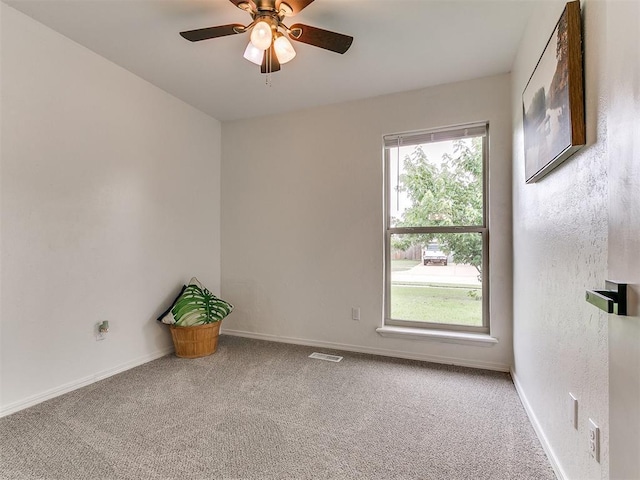 1408 Chimney Hill Rd, Yukon, OK 73099 - carpeted spare room with baseboards and a ceiling fan