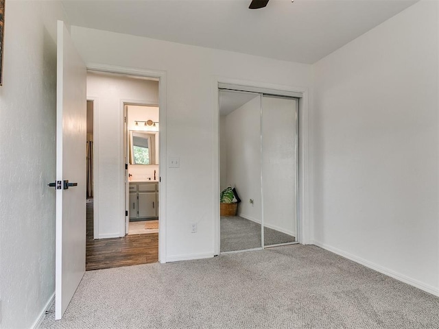 1408 Chimney Hill Rd, Yukon, OK 73099 - unfurnished bedroom with carpet floors, a closet, and ceiling fan