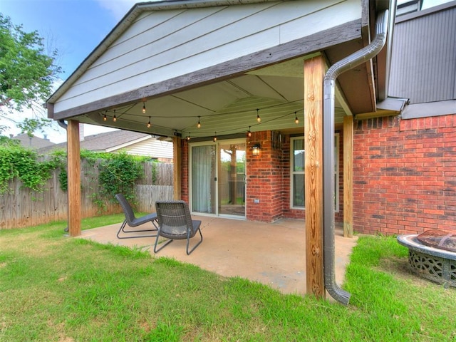 1408 Chimney Hill Rd, Yukon, OK 73099 - view of patio / terrace featuring a fire pit