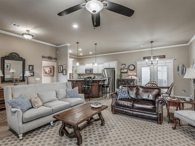 2204 Cale Cv, Yukon, OK 73099 - living room featuring a ceiling fan, ornamental molding, and recessed lighting
