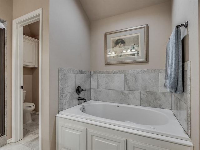 2204 Cale Cv, Yukon, OK 73099 - bathroom with a bath and tile patterned floors