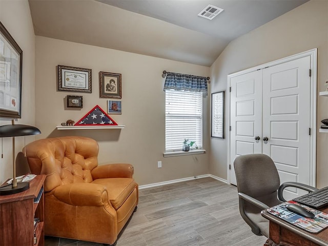 2204 Cale Cv, Yukon, OK 73099 - home office featuring light wood-type flooring and vaulted ceiling