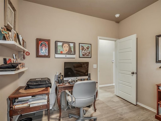 2204 Cale Cv, Yukon, OK 73099 - office with light wood-style flooring and baseboards