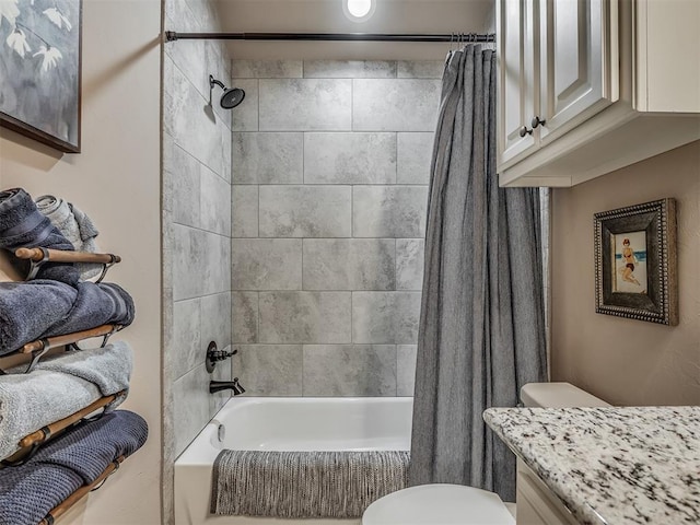 2204 Cale Cv, Yukon, OK 73099 - bathroom featuring shower / bathtub combination with curtain and vanity