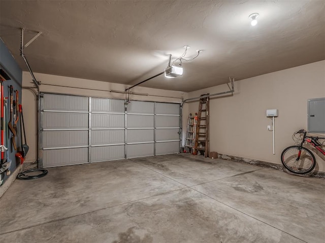 2204 Cale Cv, Yukon, OK 73099 - garage with electric panel and a garage door opener