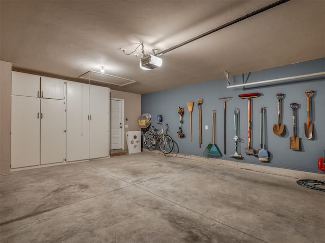 2204 Cale Cv, Yukon, OK 73099 - garage featuring a garage door opener