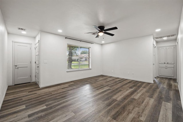 311 N Monroe Ave, Blanchard, OK 73010 - unfurnished room with ceiling fan, dark wood-style floors, and recessed lighting