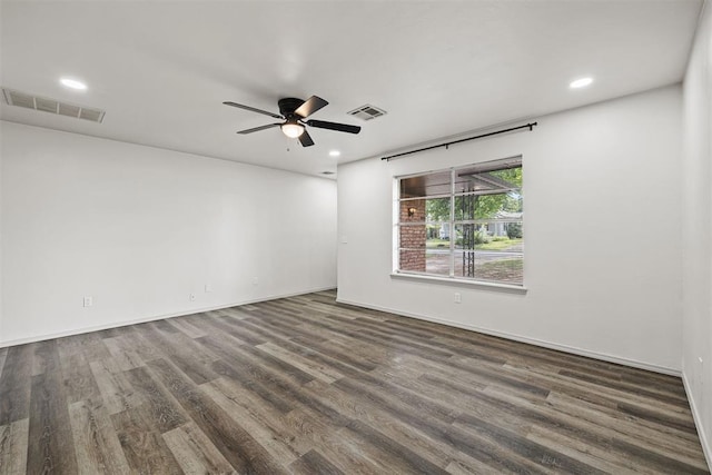 311 N Monroe Ave, Blanchard, OK 73010 - spare room featuring wood finished floors, recessed lighting, and ceiling fan