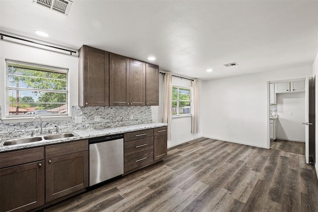 311 N Monroe Ave, Blanchard, OK 73010 - kitchen featuring stainless steel dishwasher, dark wood-style floors, dark brown cabinets, tasteful backsplash, and recessed lighting