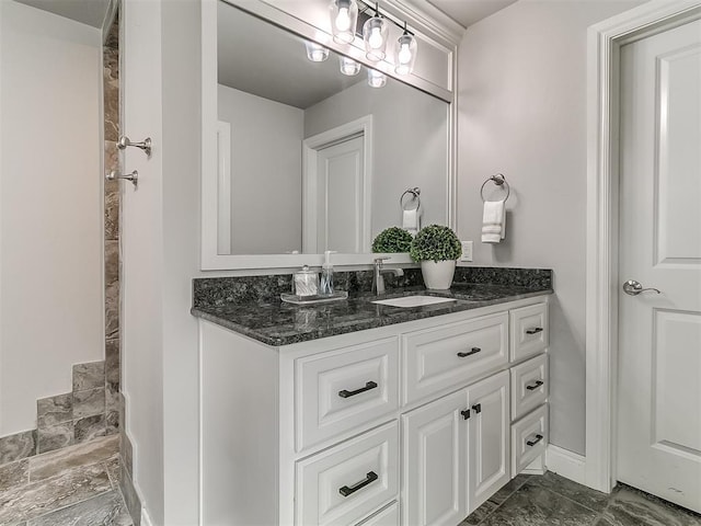 12917 Treemont Ln, Oklahoma City, OK 73142 - bathroom with vanity and marble finish flooring