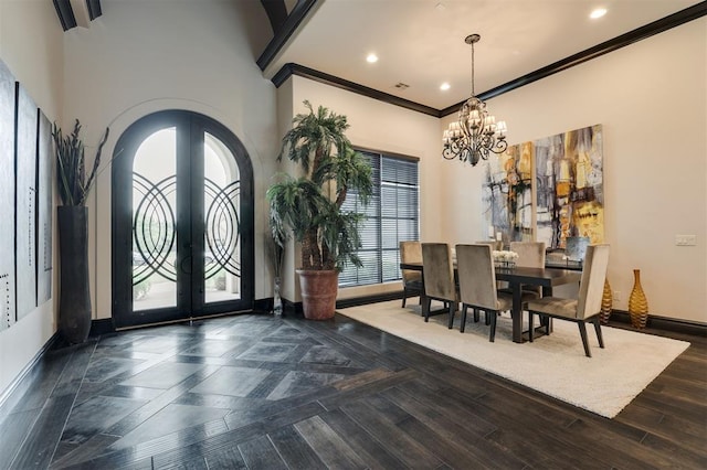 3617 Stagmoor Rd, Edmond, OK 73034 - foyer entrance with french doors, arched walkways, ornamental molding, a chandelier, and recessed lighting