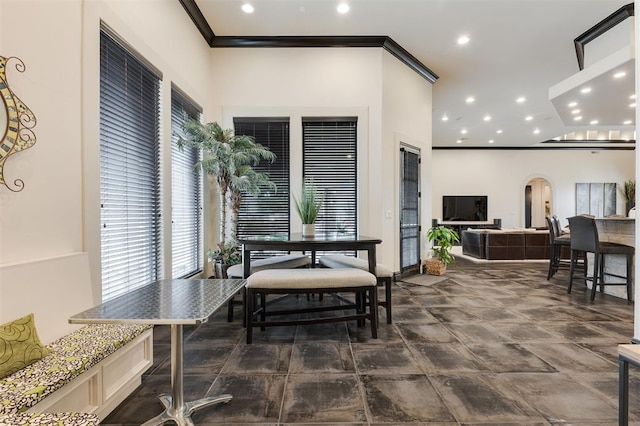 3617 Stagmoor Rd, Edmond, OK 73034 - dining space featuring plenty of natural light, recessed lighting, arched walkways, and crown molding