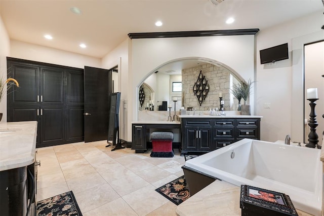 3617 Stagmoor Rd, Edmond, OK 73034 - full bath with two vanities, a freestanding bath, recessed lighting, and tile patterned flooring
