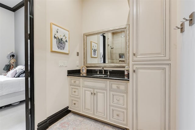 3617 Stagmoor Rd, Edmond, OK 73034 - ensuite bathroom featuring vanity and baseboards
