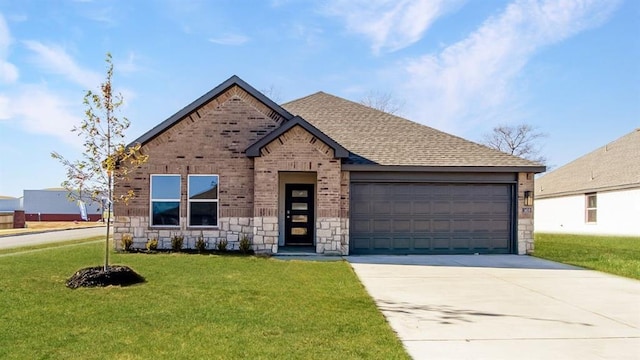 6113 Green Meadows Ln, Oklahoma City, OK 73132 - view of front of house with brick siding, an attached garage, concrete driveway, a front lawn, and stone siding