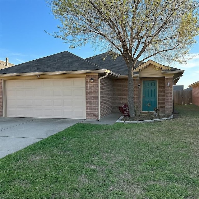 916 Beaumont Sq, Norman, OK 73071 - ranch-style house featuring an attached garage, brick siding, and driveway