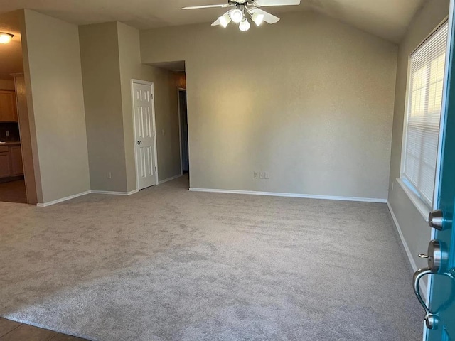 916 Beaumont Sq, Norman, OK 73071 - carpeted spare room with ceiling fan and vaulted ceiling