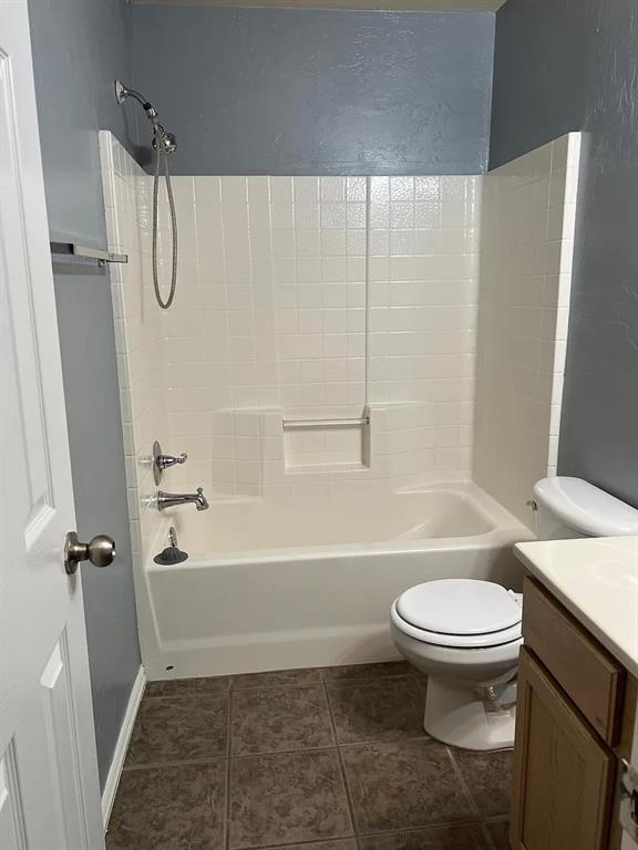 916 Beaumont Sq, Norman, OK 73071 - bathroom with shower / tub combination, vanity, and tile patterned floors