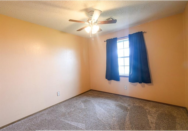 1383 N Peebly Rd, Choctaw, OK 73020 - unfurnished room featuring carpet floors, ceiling fan, and a textured ceiling