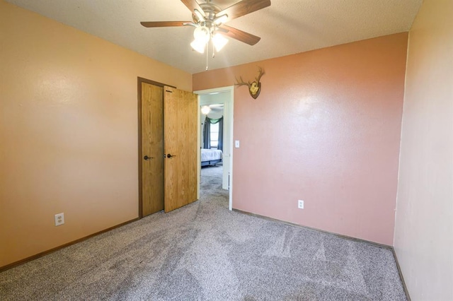 1383 N Peebly Rd, Choctaw, OK 73020 - carpeted empty room featuring a ceiling fan and baseboards