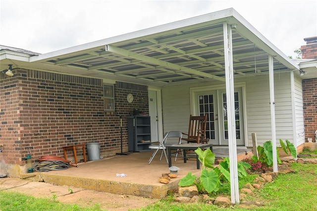 1383 N Peebly Rd, Choctaw, OK 73020 - view of patio with french doors