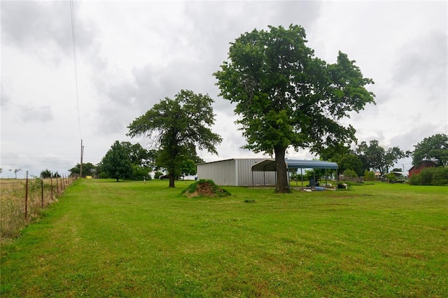 1383 N Peebly Rd, Choctaw, OK 73020 - view of yard with a detached carport