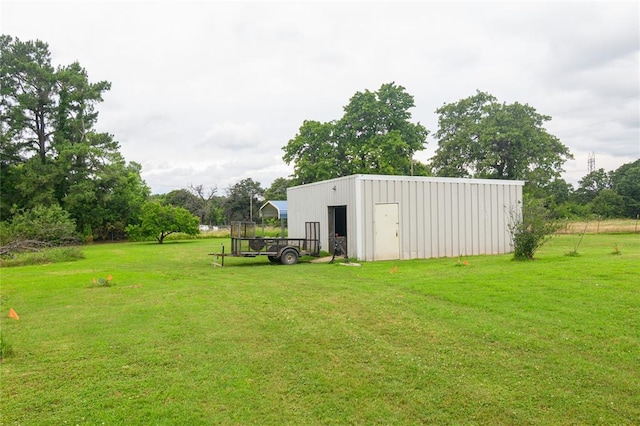1383 N Peebly Rd, Choctaw, OK 73020 - view of green lawn with a pole building and an outdoor structure