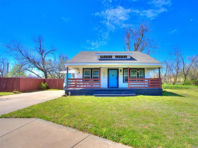 1317 N Wisconsin Ave, Oklahoma City, OK 73117 - bungalow-style home featuring covered porch and driveway