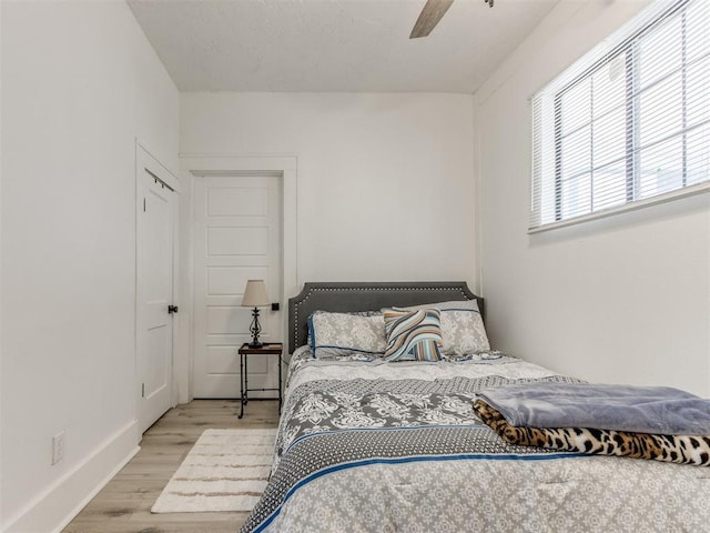 1317 N Wisconsin Ave, Oklahoma City, OK 73117 - bedroom featuring wood finished floors and a ceiling fan