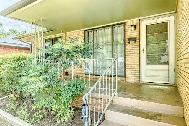 3012 NW 67th St, Oklahoma City, OK 73116 - entrance to property featuring brick siding and a porch