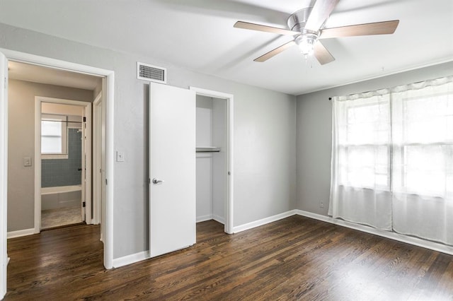 3012 NW 67th St, Oklahoma City, OK 73116 - unfurnished bedroom featuring dark wood-type flooring, a closet, and ceiling fan
