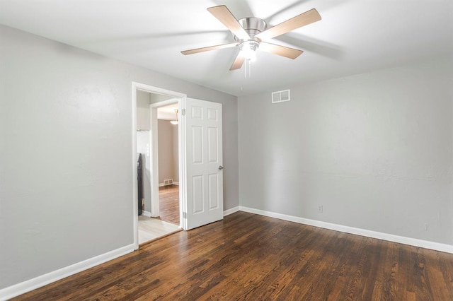 3012 NW 67th St, Oklahoma City, OK 73116 - spare room featuring wood finished floors and a ceiling fan