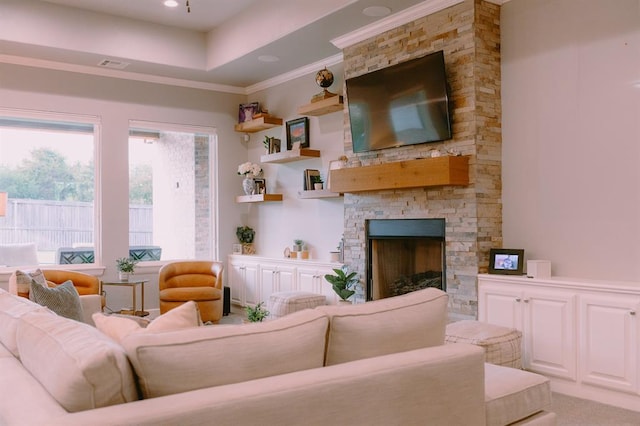 12113 SW 45th Ter, Mustang, OK 73064 - living room with a stone fireplace and ornamental molding