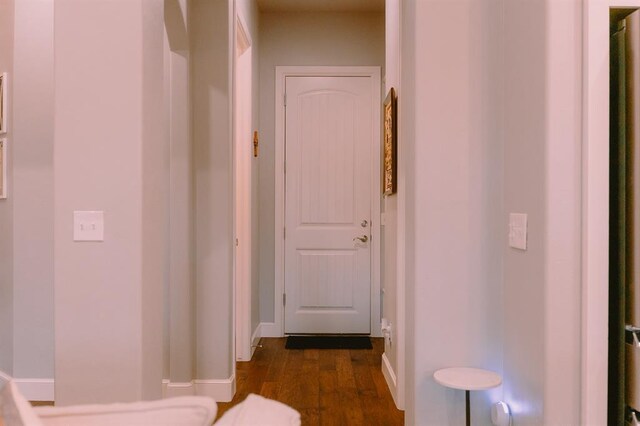 12113 SW 45th Ter, Mustang, OK 73064 - hall featuring dark wood finished floors and baseboards