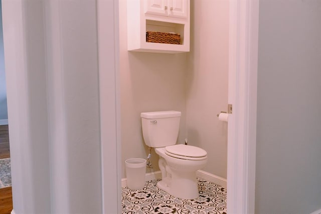 12113 SW 45th Ter, Mustang, OK 73064 - bathroom featuring toilet and tile patterned floors