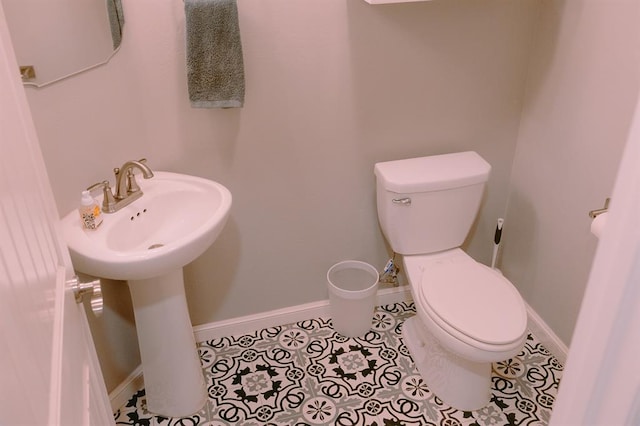12113 SW 45th Ter, Mustang, OK 73064 - half bath featuring toilet and tile patterned floors