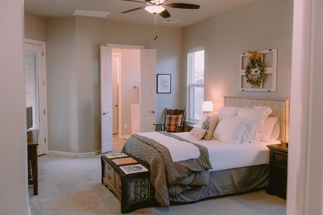 12113 SW 45th Ter, Mustang, OK 73064 - bedroom featuring light carpet and a ceiling fan