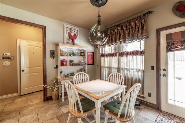 4417 Man O War Dr, Edmond, OK 73025 - dining area with baseboards