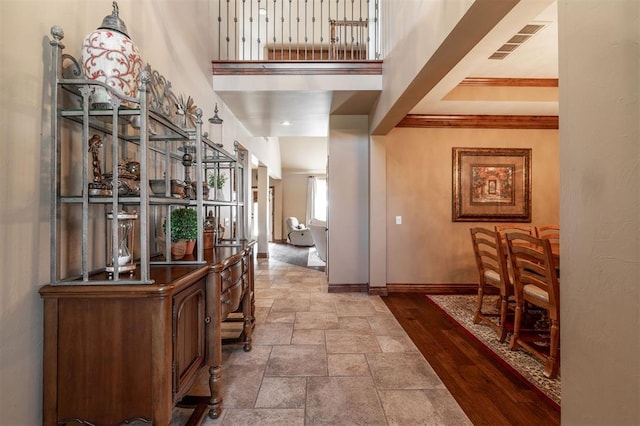 4417 Man O War Dr, Edmond, OK 73025 - foyer featuring baseboards and stone tile flooring