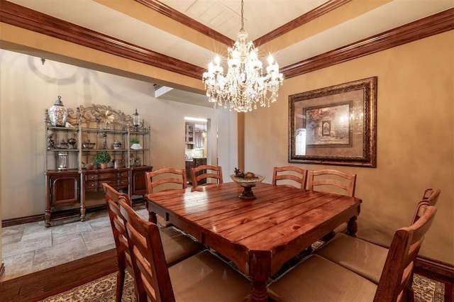 4417 Man O War Dr, Edmond, OK 73025 - dining area featuring a chandelier, stone finish flooring, a tray ceiling, and ornamental molding